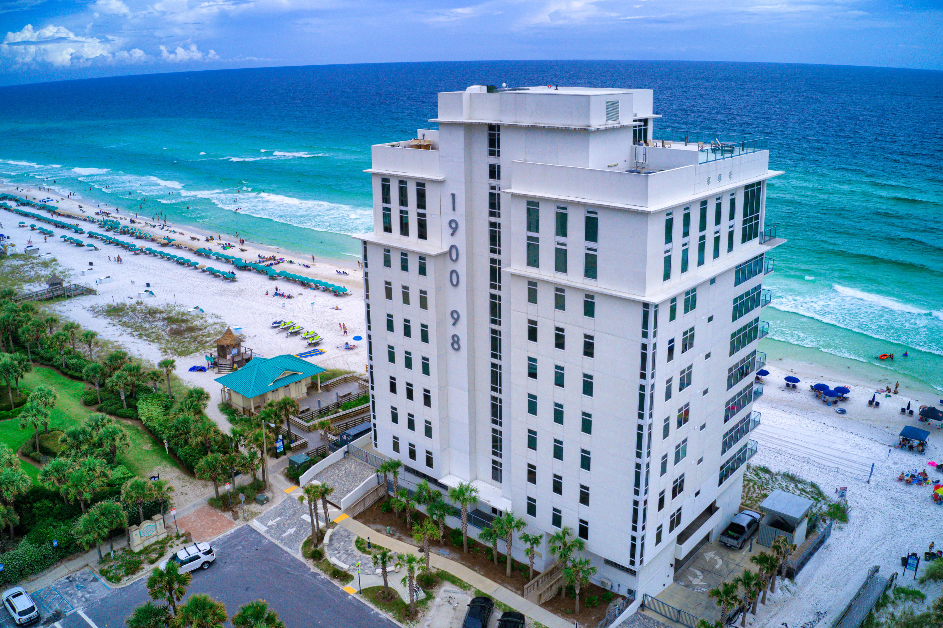 Incredible opportunity to own at 1900 Ninety Eight, Destin's newest luxury high-rise. This  sleek contemporary condo has panoramic views of the gulf along with unobstructed views of the east making it one of the only condos in Destin to offer these spectacular views.  Features include large balcony with electric grill, open floor plan allowing an abundance of natural light through expansive walls of windows, Thermador appliances in the kitchen, Lutron Electric shades, office/bunk rooms, custom tile floors in master bedroom/bath, new shower design & backsplash over soaking tubs & water softener systems within the unit.  Amenities include rooftop pool & spa, state of the art fitness center, gated entry, owner storage & parking beneath the residence
