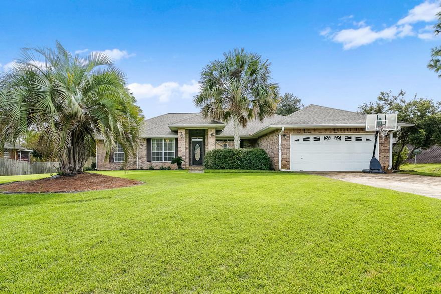 Immaculate and updated! This home is a family dream come true. Step into the beautiful Holley By The Sea community and experience all it has to offer. This 4 bedroom, 2 bath home is move-in ready for you! New roof (2017), New carpets (2017), New HVAC system (2017), New sod in front yard (2018),New LED recessed lighting, Newer hot water heater (2014), and New granite and tile throughout the home (2016). There is nothing left for you to do but bring your things and MOVE IN. Hidden Creek Drive also has a large half acre, fenced yard with room to play. Enjoy the evenings out on your expansive Florida Room or sit on the covered patio and watch the kids play.