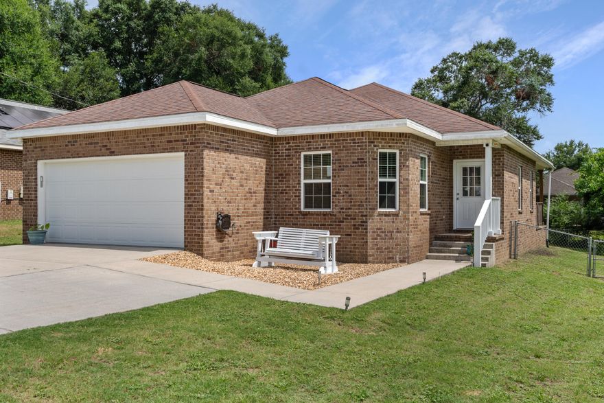 USDA ELIGIBLE = $0 DOWNPAYMENT! Ask me how you can OWN this adorable home with bringing LESS to the closing table than you would entering into a new rental agreement. Situated on a quiet street, this home features 9 foot ceilings, engineered hardwood floors in the living room and 14inch tile in the kitchen, dining, and bathrooms. Custom, soft-close cabinets in the kitchen and bathrooms offer plenty of storage. Bay windows, in the dining space off the kitchen, and the double French doors in the living room invite in lots of natural light. French doors invite you onto the covered back patio and large fenced in backyard. The home's split floorplan separates the bedrooms; the primary bedroom sits just off the living space, with a large walk in closet, en suite bathroom featuring custom, soft-close cabinets, double vanity sinks, shower, and separate water closet.. The linen closet offers plenty of storage. The other two spacious guest rooms are down their own hallway, past the kitchen and living room. The guest rooms share a hallway bathroom with shower/tub combination and single vanity sink. The mudroom/laundry room is adjacent to the guest hallway with washer and dryer hook ups and utilities storage. The laundry room leads out into the full size double car garage. The oversized driveway offers plenty of parking with enough room for a boat or camper. Freshly painted front entryway and porch swing welcomes you home. The outdoor patio furnishings and any existing furniture may convey with the sale of the property. Welcome, take a look, and fall in love with this well kept home. Buyer to verify all deemed to be important.

