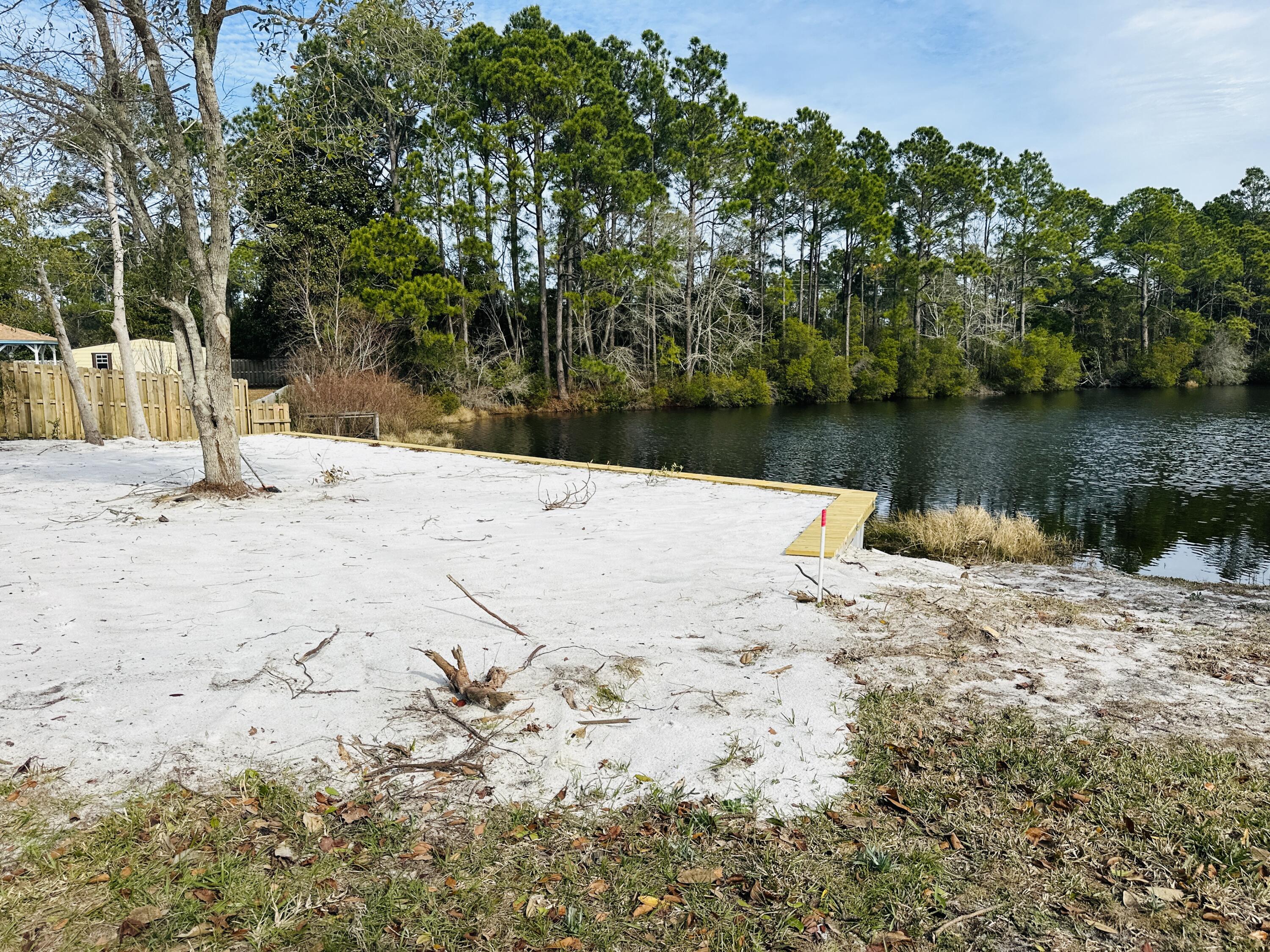 Come build your dream home on this cleared 0.40 acre lot boasting 75 feet of lakefront footage. Featuring a professionally constructed seawall (the seawall alone costs $30,000).Well established family oriented, sidewalk lined neighborhood with NO HOA. This Lot is the ideal canvas for your new home, offering unobstructed views of the serene lake surroundings.Lot is not in a flood zone.
