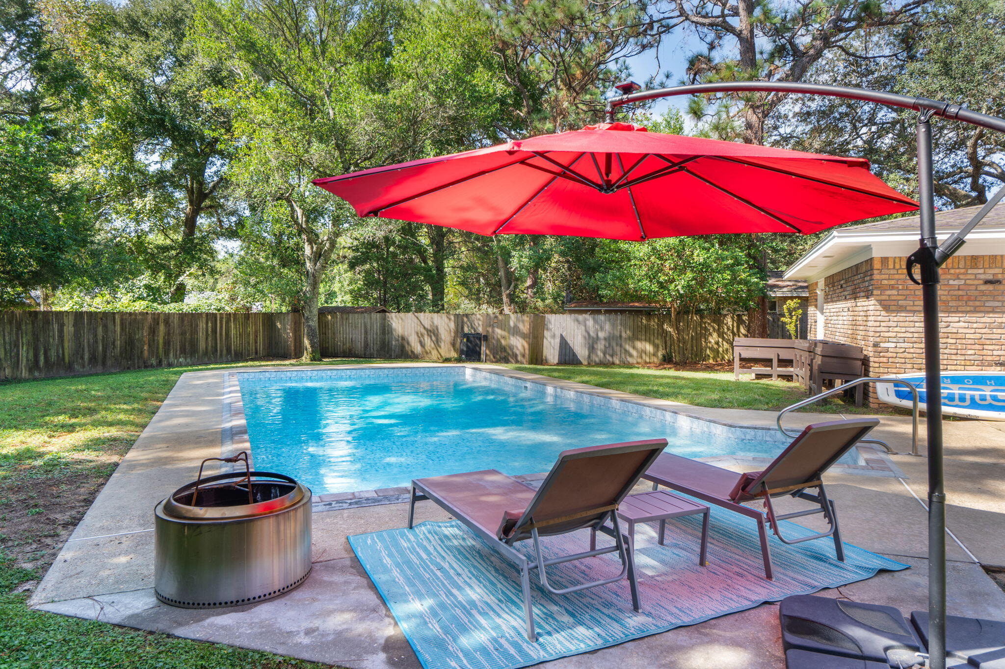 Stunning Pool Home in the much sought after Poquito Bayou. Conveniently located between Eglin AFB and Hulburt Field. New Pool Liner, New HVAC! Plus fresh paint makes this awesome home move in ready! From the moment you step in the front door the huge open living room welcomes you in. Updated kitchen with granite counters. The dining area over looks the pool and has a fireplace. LVP flooring in the living areas. The primary bedroom is huge! And the closet is big enough for all of your clothes and be a dressing room! The other 3 bedrooms are good sizes! The perfect backyard for long summer days by the pool. Shed in the backyard. NO HOA. Park your boat or RV on the property! Poquito Bayou has both a Boat Ramp and Playground. Move in Ready Home!