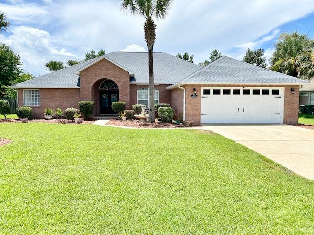 AVAIL: 10/11. SEC DEP = $3,200, can be broken up in 2 monthly installments, if qualified. GORGEOUS home for rent in a waterfront community! Beautiful covered double front door entry welcomes you to quality finishes that include vaulted ceilings, crown molding, columns, a gas fireplace & large porcelain tile flooring set on a diagonal throughout the main living areas. The kitchen features a breakfast area, granite counter tops & backsplash, stainless appliances & solid wood cabinets w/ a wine rack. The master suite features trey ceilings, a separate sitting area/nursery/gym/office w/ bookshelves, 2 walk-in closets, double vanity sinks, whirlpool tub & separate shower. 276 sqft FL room w/ wall of windows has access from the master/kitchen/living room. 2 guest bedrooms w/ a bathroom in between have a separate wing, for extra privacy. The inside utility room has a convenient sink & washer & dryer included. Other features are newer LVP flooring in the bedrooms, brushed nickel hardware throughout, ceiling fans, sprinkler system w/ lawn pump & timer, tank-less gas water heater, large privacy fenced backyard, outside gas grill hookup, enhanced landscape lighting, yard building & garage wall unit for tools & storage. Nice gazebo, expansive paver patio & large granite table top to gather around outside in your serene backyard. Neighborhood has a community area/gazebo on the Santa Rosa Sound w/ beach access. Exceptional floor plan & location! Convenient to schools, shopping & the beaches. Basic quarterly pest control & bi-weekly lawn service (mow/edge/blow) included in the rent. Welcome home!