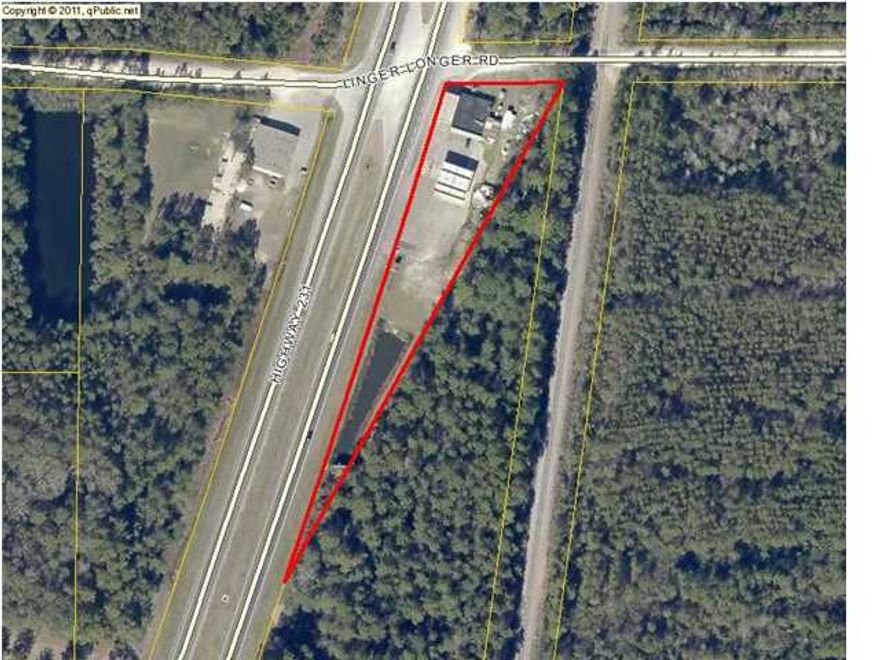 Many recent improvements and additions to this free-standing corner property currently used as a convenience store and gas station. Over 750' on Hwy 231 and a total of 1.38 acres. Great location and very high visibility. Call for showing availability and any other information.