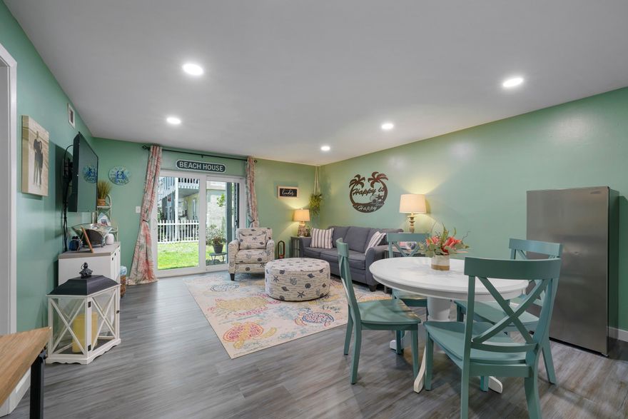 Furnished VA approved condo-listed $25,000 below appraised value! Welcome to Commodore's Landing #103 a completely remodeled end unit- 2 bed, 2 bath condo located on Okaloosa Island! $37-$41K in projected rental income!  The owners have thoughtfully upgraded the unit throughout, including: LVP Flooring, fresh paint and new baseboards, new fixtures, new stainless kitchen appliances, recessed lighting, new HVAC, new hot water heater, upgraded hurricane impact resistant windows & sliding doors with tint, and an upgraded composite front porch. A true bargain for a fully upgraded, versatile property that allows short term rentals and is pet friendly. Public beach access to the Gulf of Mexico is nearby, just across the street, and the property is central to all the amenities on Okaloosa Island
