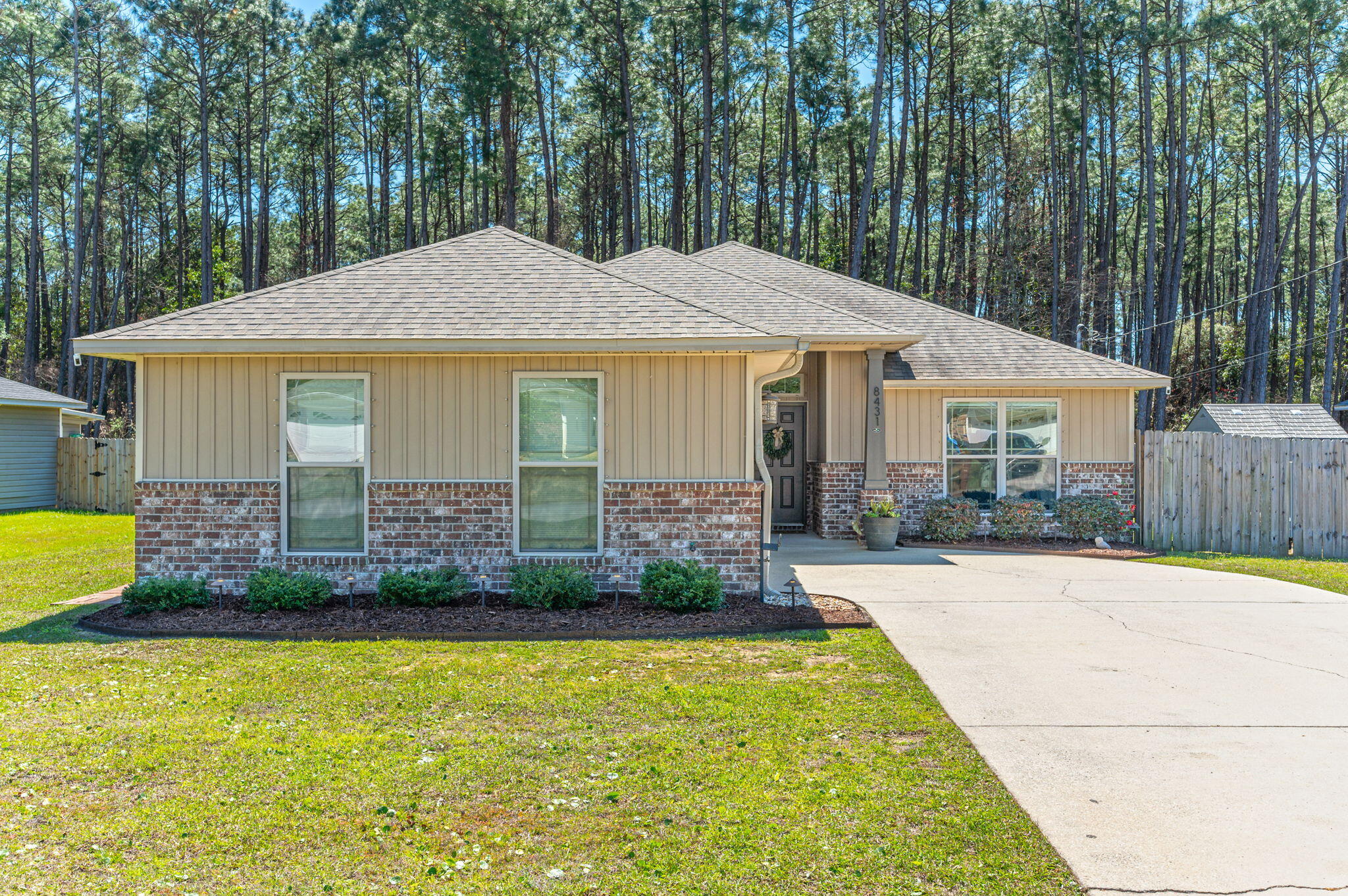 Welcome home to a beautifully maintained 3-bedroom, 2-bathroom home spanning 1,744 sq ft on a 0.33-acre lot. Nestled in a peaceful neighborhood, this home offers an open-concept design, modern features, and a spacious backyard.The master suite boasts a walk-in closet, dual vanities, and a separate tub and shower. The gourmet kitchen features granite countertops, stainless steel appliances, rich wood cabinetry, and a large island with bar seating, seamlessly flowing into the dining and living areas. High vaulted ceilings, recessed lighting, and modern finishes create a bright and inviting atmosphere.The outdoor retreat includes a brick-paved patio and a fenced backyard, offering privacy and plenty of room for entertaining. Move-in ready and well-maintained, waiting for new owners!