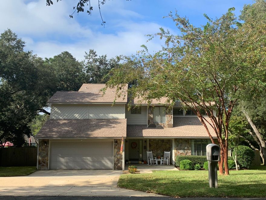 This beautifully updated lakefront home in Bluewater Bay is a nature lover's paradise! The large, fully fenced lot includes mature oaks, azaleas, jasmine, lily magnolia, blueberry bushes, orange tree, & crepe myrtles, all home to multiple species of birds. The lake abounds with fish and turtle watching is fun for children and adults alike! Inside the home you will enjoy views from nearly every room!  Modern kitchen w/ new appliances & quartz countertops&#65533; Dec. 2016, all new luxury vinyl plank flooring downstairs- 2019, fresh interior paint, all new trim + board-and-batten molding & interior doors&#65533; 2020. NEW HVAC &#65533; Fall 2016, NEW roof WITH transferrable warranty &#65533; 2018, NEW hot water heater &#65533; 2019, NEW wood on dock&#65533; 2017, NEW metal fence along the lake &#65533; 2016. The master suite features...
