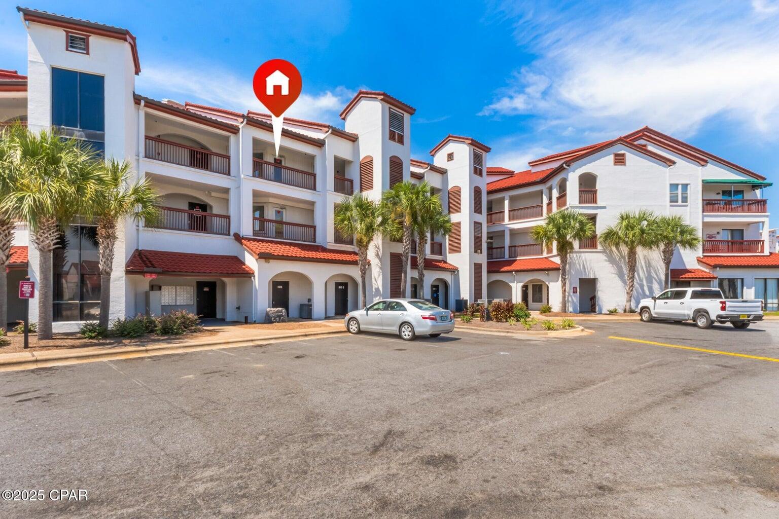Tucked inside the gated community of the Plazas of St. Thomas, this updated third-floor condo offers the perfect blend of comfort, location, and resort-style amenities just blocks from the sugar-white sands of Panama City Beach. Inside, the one-bedroom layout features a light-filled living area and spacious bedroom with generous closet space. The kitchen is equipped with stainless steel appliances and flows easily into the dining and living areas--ideal for everyday ease or short-term rental potential. Step outside to enjoy your private balcony or explore the grounds, where a community pool, tennis courts, shuffleboard, dock, BBQ grill, and clubhouse invite relaxation and recreation. Residents also enjoy water, trash, exterior maintenance, and groundskeeping included in the quarterly HOA fee. Located just south of Grand Lagoon, you're minutes from beach access, St. Andrews State Park, restaurants, shops, and marina adventures. Whether you're looking for a full-time residence, vacation home, or income-producing property, this turn-key unit checks all the boxes.