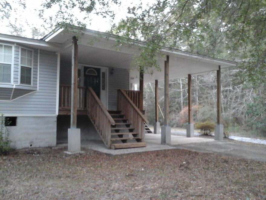 Great place to escape and unwind! This remodeled country home is nestled on 2.6 acres of mature trees. Large comfortable living room welcomes you to sit down and relax. The kitchen dining area is open and bright with lots of windows and 2 accesses to the large back deck. The deck overlooks the level back yard, so get ready to do some outdoor entertaining!!!! The drive is paved leading to the back yard where you will find a barn and storage shed. If you like the outdoors with room to roam look no further!Seller to include home warranty.