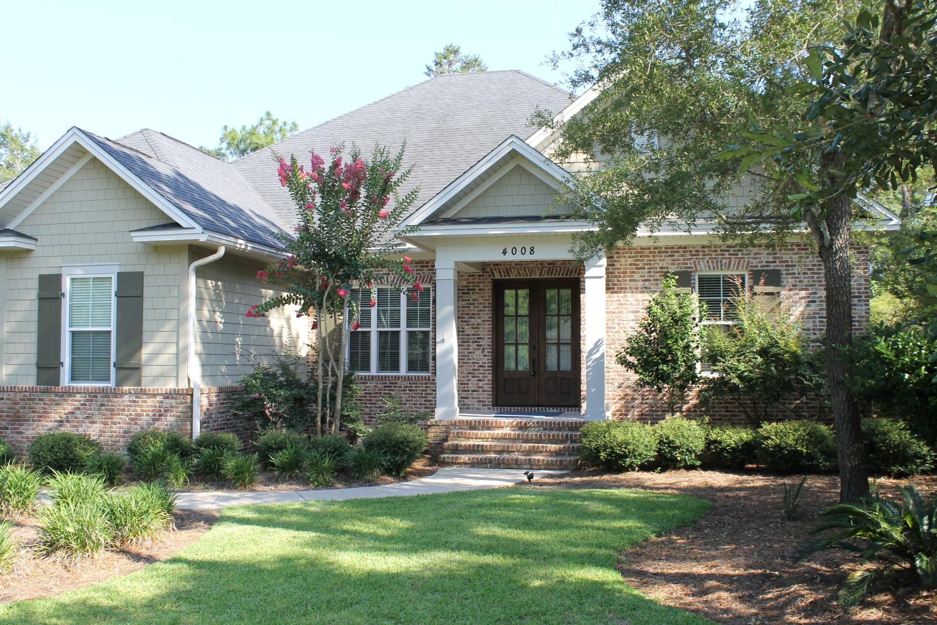 Beautiful Randy Wise Earthcents home boasts 3,000-sq.ft. Brick siding with hardi accents, foam insulation, two car garage salt water pool with enclosure and privacy fence that finish the stunning exterior. The interior of the home has a large inviting foyer, dining room, Office/5th bedroom, and a fully appointed kitchen with large breakfast bar, GE Cafe' stainless steel appliances. Granite counter tops and stained alder cabinets throughout the home. Upscale touches include 12' ceilings, 8' entry door and 5''crown, cased windows (impact glass), 2'' blinds and a light mahogany front entry. Master suite with large walk-in closet, garden/jet tub and shower upgraded with a frameless heavy glass enclosure. New interior paint and new carpet complement this wonderful home. This is a MUST SEE!!