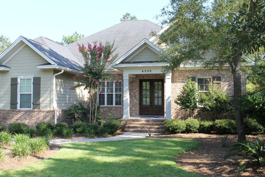 Beautiful Randy Wise Earthcents home boasts 3,000-sq.ft. Brick siding with hardi accents, foam insulation, two car garage salt water pool with enclosure and privacy fence that finish the stunning exterior. The interior of the home has a large inviting foyer, dining room, Office/5th bedroom, and a fully appointed kitchen with large breakfast bar, GE Cafe' stainless steel appliances. Granite counter tops and stained alder cabinets throughout the home. Upscale touches include 12' ceilings, 8' entry door and 5''crown, cased windows (impact glass), 2'' blinds and a light mahogany front entry. Master suite with large walk-in closet, garden/jet tub and shower upgraded with a frameless heavy glass enclosure. New interior paint and new carpet complement this wonderful home. This is a MUST SEE!!