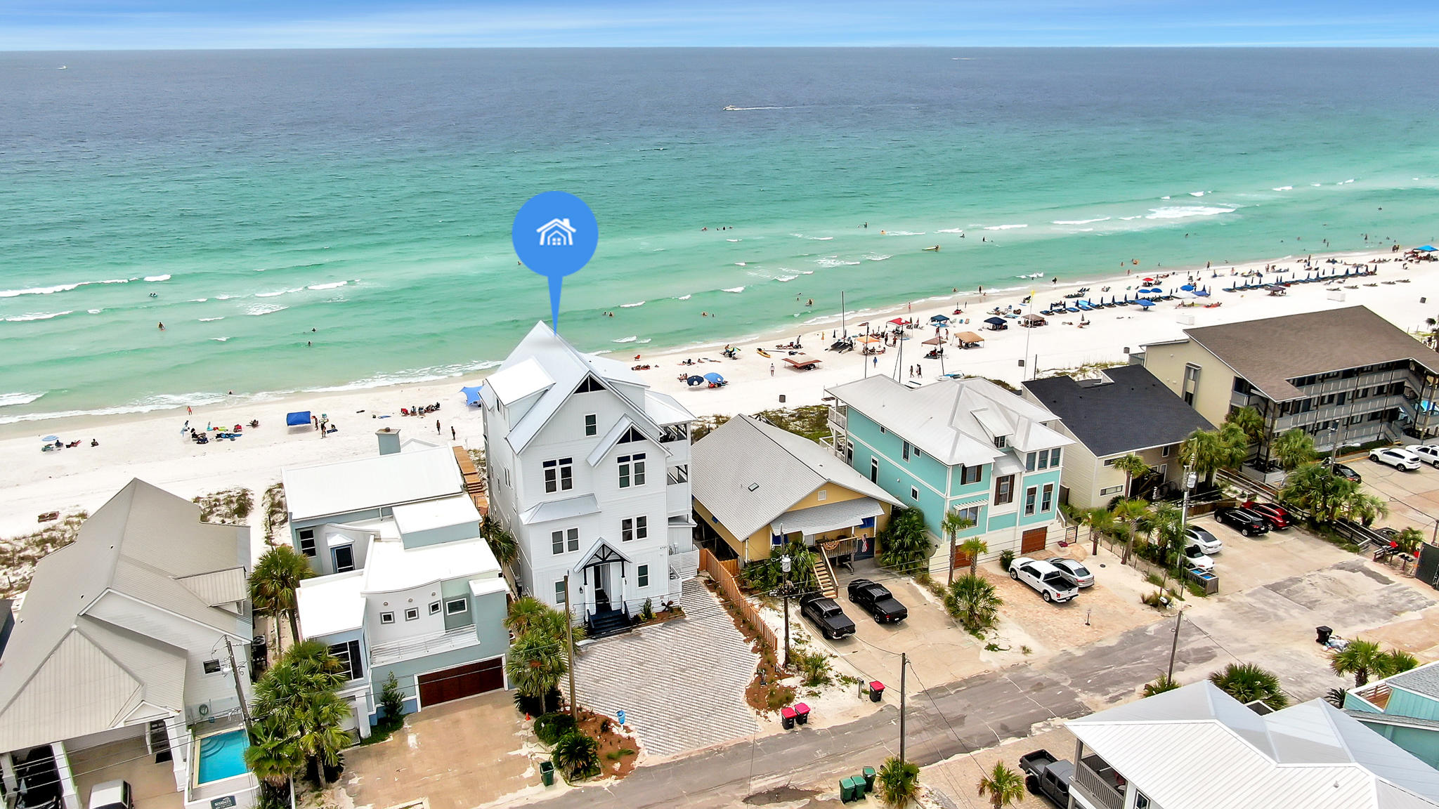 ''Coastal Dreaming''...The name says it all! This amazing beachfront home will keep you dreaming with 9 bedrooms, 9 1/2 Baths, 5,476 sq. ft. of spacious indoor living plus 1,826 sq. ft. of beautiful outdoor living space including a poThe breathtaking view from all four levels a pool, rec room, and beachfront! The first floor will feature two bedrooms and each will have a connecting bathroom. Walk towards the beach side of the house and find the rec room that will lead you outside to the pool deck. This floor will also feature the first set of washer/dryer. Travel up to the second floor to find the main kitchen, dining, and living area. Also on this floor is two more bedrooms with connecting bathrooms to each room. Walking up to the third floor and you will come up and see the seating are