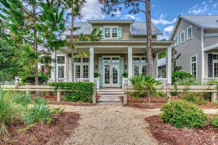 This Beautiful Romair built home in Watercolor Crossing's District offers 3 bedrooms plus bunk room with closet and 3 full and 2 half baths. 2nd Family Room upstairs. Hardwood flooring throughout and Carrera marble countertops. Custom Cabinetry and 12' ceilings in the main living area. Large Lot with room for a Carport or Garage with pool. Home is being offered Partially Furnished.