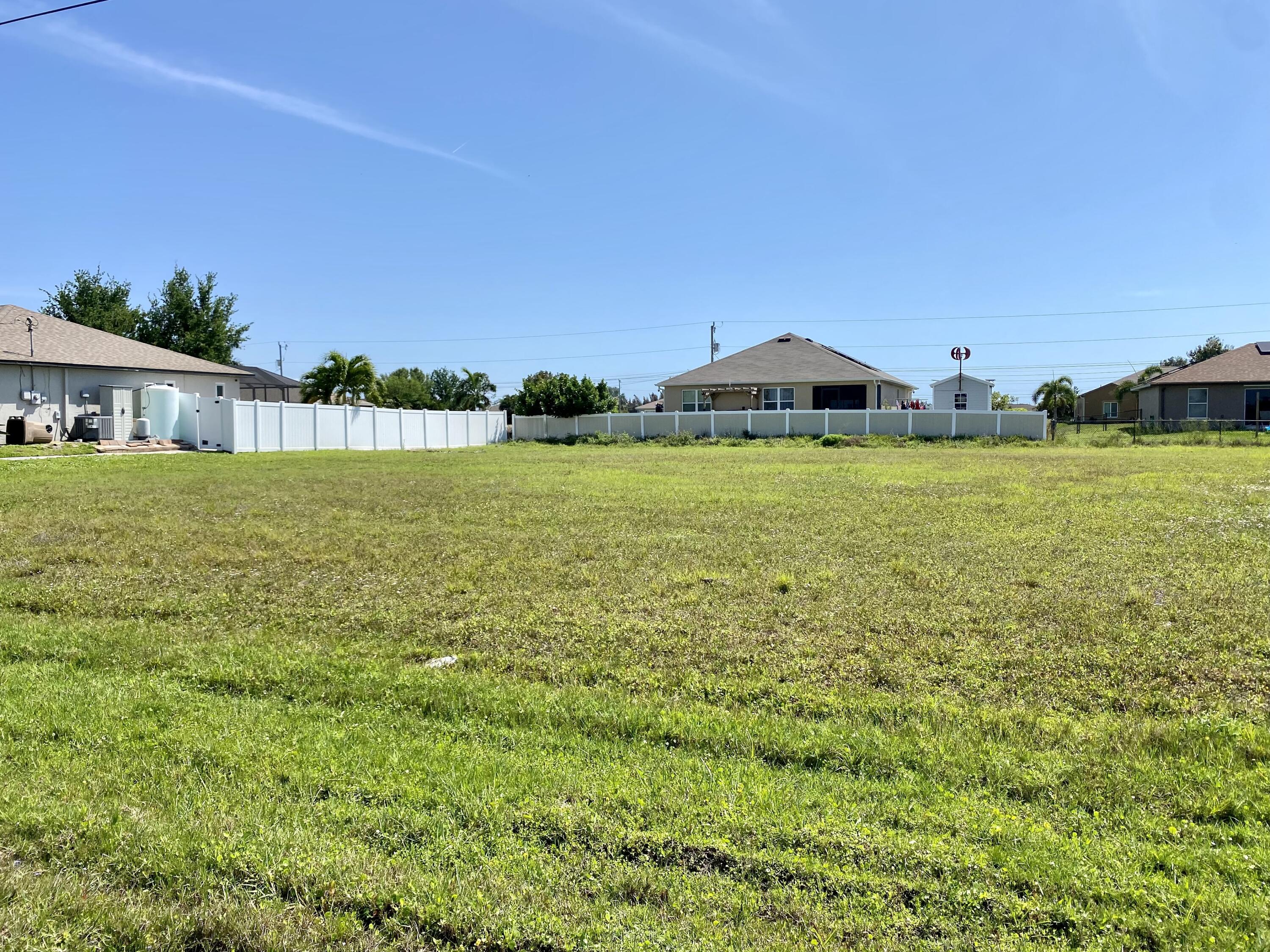 .24 ACRE lot located in the desirable community of Cape Coral. Cleared, NO Flood Zone. Electric at the road. Within city limits, paved road access to lot. Conveniently located to Mariner High School, Middle School and Trafalger Elementary School and conveniences.Seller has burrowing owl survey. No owls or nests on property.