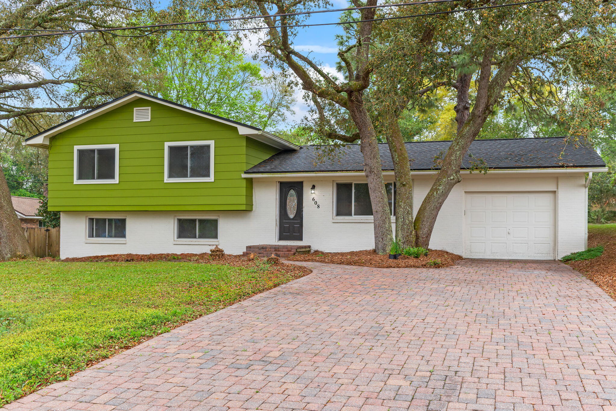 Charming Split-Level Home in Fort Walton Beach, FL! Welcome to your dream home! This beautiful split-level home offers the perfect blend of comfort and style in the heart of Fort Walton Beach. Featuring 4 spacious bedrooms, 2.5 bathrooms, and a versatile bonus room, this home has all the space you'll need. Inside, you'll find hardwood floors and a kitchen adorned with granite countertops. Major systems have been thoughtfully maintained, including a three-year-old roof, water heater, and HVAC system, offering peace of mind for years to come. Located in a welcoming neighborhood, this home is just minutes from excellent schools, shopping, dining, and the stunning beaches of the Emerald Coast. Whether you're hosting lively gatherings in your bright living spaces or enjoying a quiet retreat in your private backyard, this home is perfect for creating lasting memories. Don't wait, schedule your private showing today and make this Fort Walton Beach treasure your own! Seller is a licensed real estate agent.