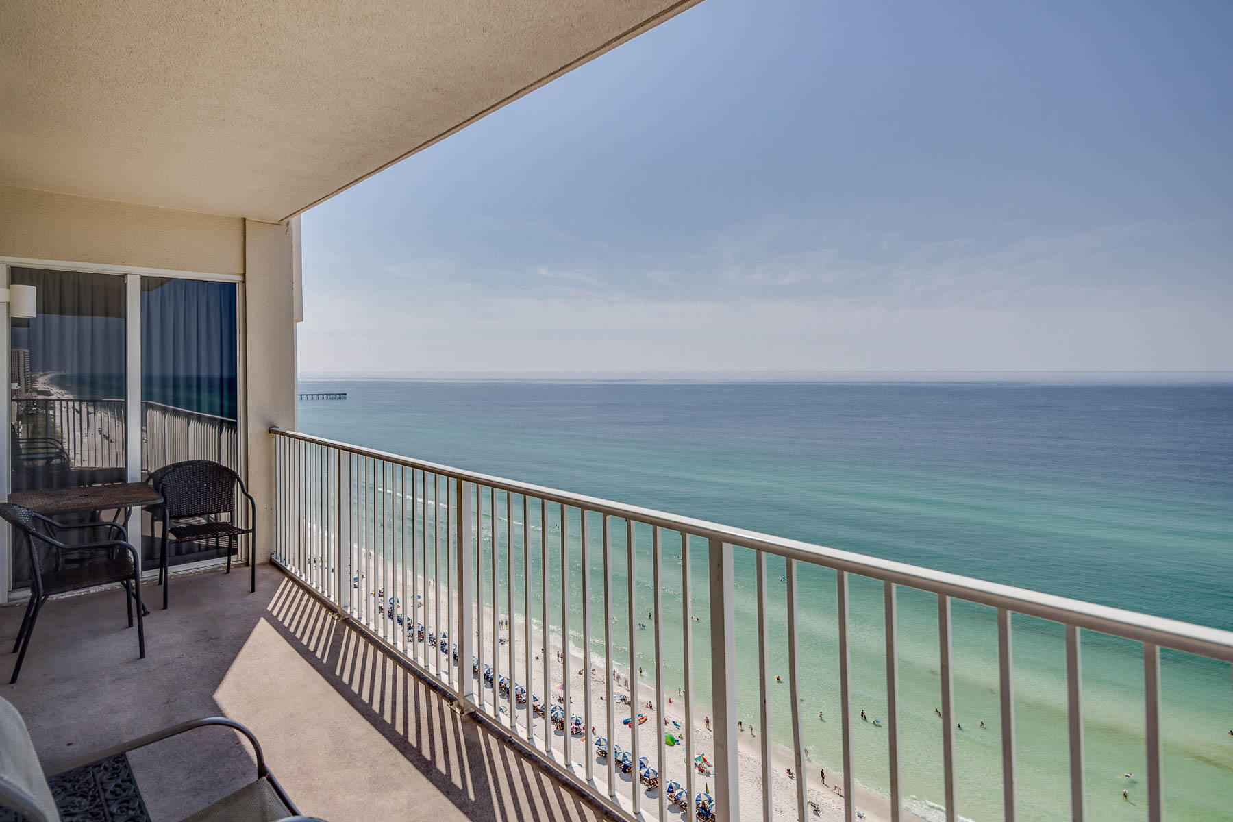 Are you looking to experience stunning views of the Gulf of Mexico with magnificent sunset views? Then Tidewater Unit 1501 is the one you are looking for! From this west end unit you will experience amazing Gulf views through the floor to ceiling glass in the living area, as well as the wraparound balcony! This unit features 3 bedrooms, 3 bathrooms, a bunk room and a separate utility closet. Wake up in your Gulf-front Master Bedroom and then enjoy breakfast on the wraparound balcony which provides scenic views of the Gulf and one of our freeform pools. This unit boasts beautiful 18-inch diamond pattern ceramic tile throughout the living area and all bedrooms! This unit has lots of closet space as well as cabinet space. The kitchen opens to the huge living area and comes complete