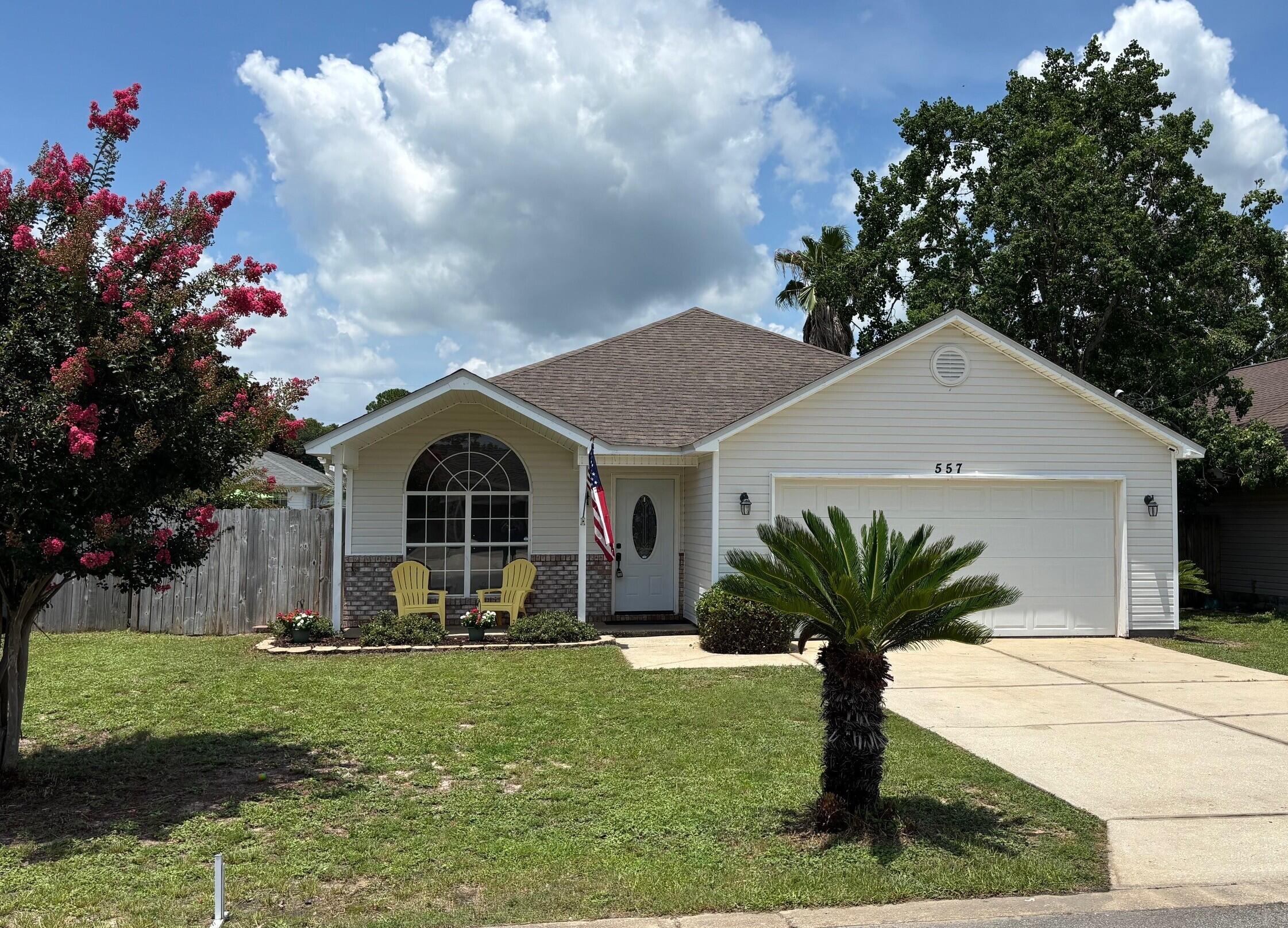 Professional Photos Coming! This 3-bedroom, 2-bath home is conveniently located between Hurlburt Field and the beaches of Navarre.Inside, the living room offers a raised ceiling and a large circle-head window filling the space with natural light. The kitchen and dining area are functionally designed with a pantry and plenty of cabinet space. Both bathrooms have been remodeled.The primary suite includes sliding glass doors to the back patio & walk-in closet in the en-suite bath. The second bedroom features a bay window giving extra natural light, and the third bedroom is located across from the guest bathroom.Important updates include new Roof in 2017, HVAC 2021, & Water Heater 2020. The back half of the garage was converted to an indoor laundry room and office/storage.