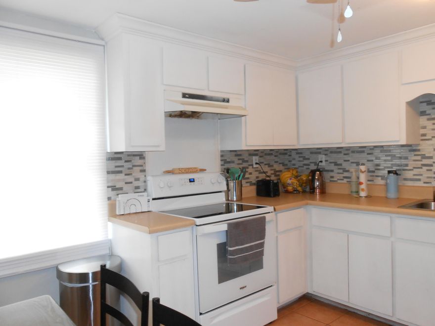 An Approximate 12.4 acre parcel with 2 buildings, and a small pole barn.  There is a mobile home sitting on the southeast corner of the parcel that  belongs to the tenant who is leasing the .8 acre track that it sits upon.   An RV trailer is currently parked on the  parcel but will be removed prior to closing.  The larger building was a church with an auditorium, It has 2 half bathrooms plus out rooms for small classes.  It has 2400 sf of heated space.  The second building is a residence with 1100 sf of heated space.  It has 3 bedrooms and 1 full bath.  It has been upgraded as well.  The parcel is high and dry and has easy access to Hwy 331.  There is a lot of potential and a variety of use for this property.  Call for a showing appointment.