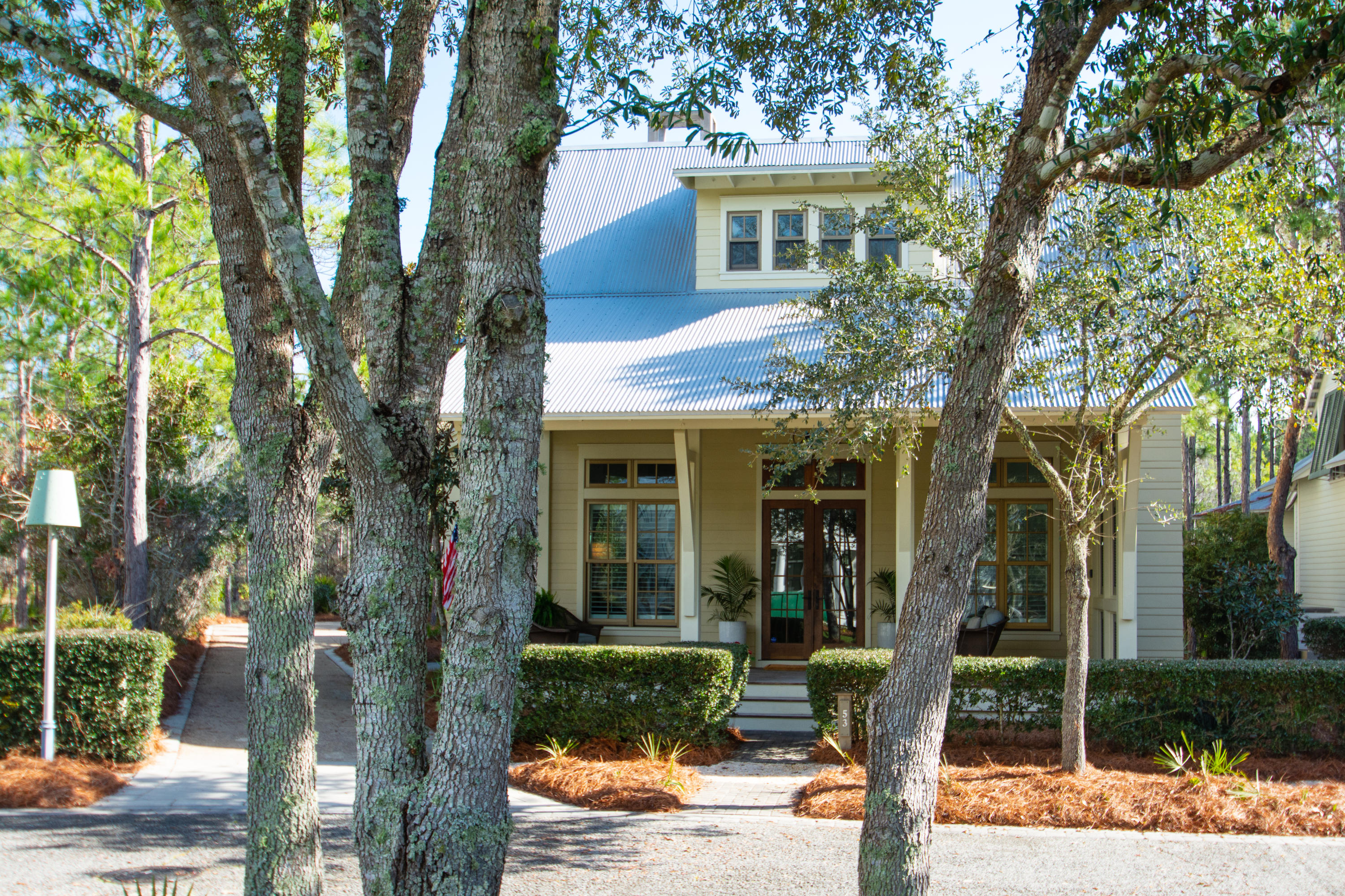 Peace and serenity abound in this original Geoff Chick designed WaterColor home, located in quiet area of Phase II with preservation area behind the expansive backyard. This is one of the largest homesites in WaterColor and also faces a lovely green park and has a circular driveway with room to add a garage with carriage house and even space for a pool!The residence also has a chefs dream kitchen with professional appliances including large 6 burner stove/oven, warming drawer, 2 refrigerators, 2 deep farm sinks, a wine cooler and large Carrera marble waterfall countertop.The 1st floor master suite has XL walk in closet, large shower and separate soaking tub. With the adjacent screened porch makes this an amazing and private retreat space.