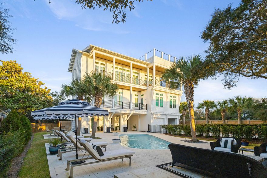 Introducing 27 White Sands Drive, an exquisite coastal retreat located near Grayton Beach in the tucked away community of Gulf Trace! This one-of-a-kind 5 bedroom, 5.5 bathroom home has been completely remodeled from top to bottom, with no expense spared and tons of square footage added to the original footprint. Panoramic Gulf views overlooking State Forrest will take your breath away from the 3rd floor open-concept kitchen and living, and 4th floor observation deck. The outdoor entertaining space features a private pool and large sunbathing patio complete with an outdoor fireplace perfect for enjoying cozy evenings. The first floor boasts a bunk room and full bath, that also serves as a pool bath for guests and oversized two-car garage with room to store all of your beach necessities, and a private elevator. Head up to the 2nd level where you will be greeted by your spacious, luxuriously designed primary suite with natural light pouring in and a spa-like bathroom. Also on this level, you will find 3 additional private king bedrooms, each with their own personality and ensuite bathrooms providing a private oasis for guests. The third floor is home to main living space featuring a modern fireplace as the focal point of the room and surrounded by open shelving and curated coastal furnishings, and gorgeous vaulted ceilings. Step over to the Chef's kitchen equipped with professional-grade luxury appliances, a custom range hood, custom cabnitry with ample storage, and a show-stopping oversized kitchen island with waterfall countertops and attached seating. Entertaining is made easy with additional seating for 6 in the formal dining room and wet bar for stocking your favorite beverages. The kitchen is complete with a butler's pantry providing additional storage and serving as a coffee bar. This home is a must see! 