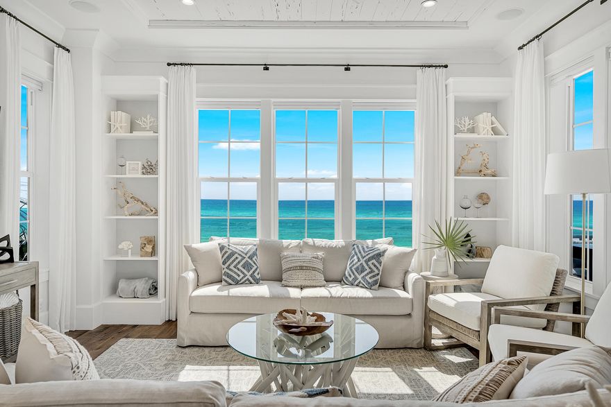 Nestled along the pristine shores of Inlet Beach, 94 Emerald Cove Lane South offers a rare opportunity to experience the epitome of coastal luxury living. This Gulf-front residence seamlessly blends sophistication with the serenity of its natural surroundings, spanning 2880 square feet with 40 waterfront feet and boasting unparalleled craftsmanship.The interior exudes coastal elegance with 5 bedrooms, 6 bathrooms, and comes equipped with an elevator facilitating easy access to each level. The elegantly appointed gourmet kitchen is designed with top-of-the-line appliances and custom cabinetry.The master suite on the fourth level is a sanctuary of relaxation with panoramic Gulf views, and the ensuite bathroom is a spa-like retreat with tasteful grandeur. Each thoughtfully designed bedroom ensures a private oasis for comfort and tranquility for your family and guests.   The outdoor spaces invite you to savor morning coffee and apr??s beach cocktails while taking in the awe inspiring sunrises and sunsets. 

Located in the beachside community of Inlet Beach, this residence offers more than just a home; it provides a lifestyle with walkability to shopping and restaurants on 30A and the neighboring communities of Rosemary Beach, Seacrest Beach, and Alys Beach.

With its meticulous design, prime location, and short term rental income performance, 94 Emerald Cove Lane stands as a solid investment, promising the ultimate coastal luxury experience where every detail embodies the pinnacle of beachfront living. 