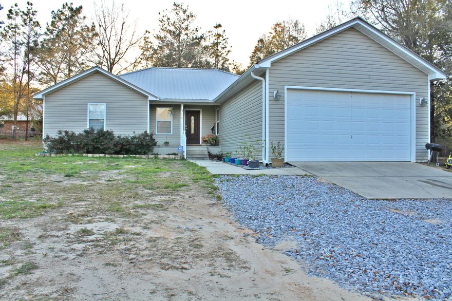 Gorgeous four-bedroom, three bedroom custom home in excellent condition. This home has to many features to list them all! Spacious living room with attached dining area and open kitchen. The kitchen features a breakfast bar, new stainless steel refrigerator and pantry. Master bedroom suite has his and her walk in closets, custom shower and Jacuzzi style tub. One of the bedrooms is set up perfectly for a guest suite with an over-sized closet and en-suite bathroom. This home is conveniently located to Lake Juniper and the Lake Juniper public boat ramp, along with everything that DeFuniak Springs has to offer! Make your appointment today!