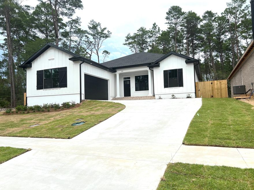 UNDER CONSTRUCTION.  Charming,  Craftsmans-style, 1 story home in Niceville's newest neighborhood Deer Moss Creek!  This home features 3 bedrooms, 2 full baths and an office.  Shaker Style cabinets, granite countertops, stainless steel appliances and luxury vinyl plank flooring. Impact Resistant windows and doors. Side entry 2 car garage.  Built by a Parade of Home local builder. DMC is a mixed-use community planned to include single-family, multi-family, commercial, a village center, and a light industrial area. A paved trail system is planned to run along the creek. Future plans for Phase 2 include a community pool, club house, and bike paths. Construction Intended Completion: Fall 2022
