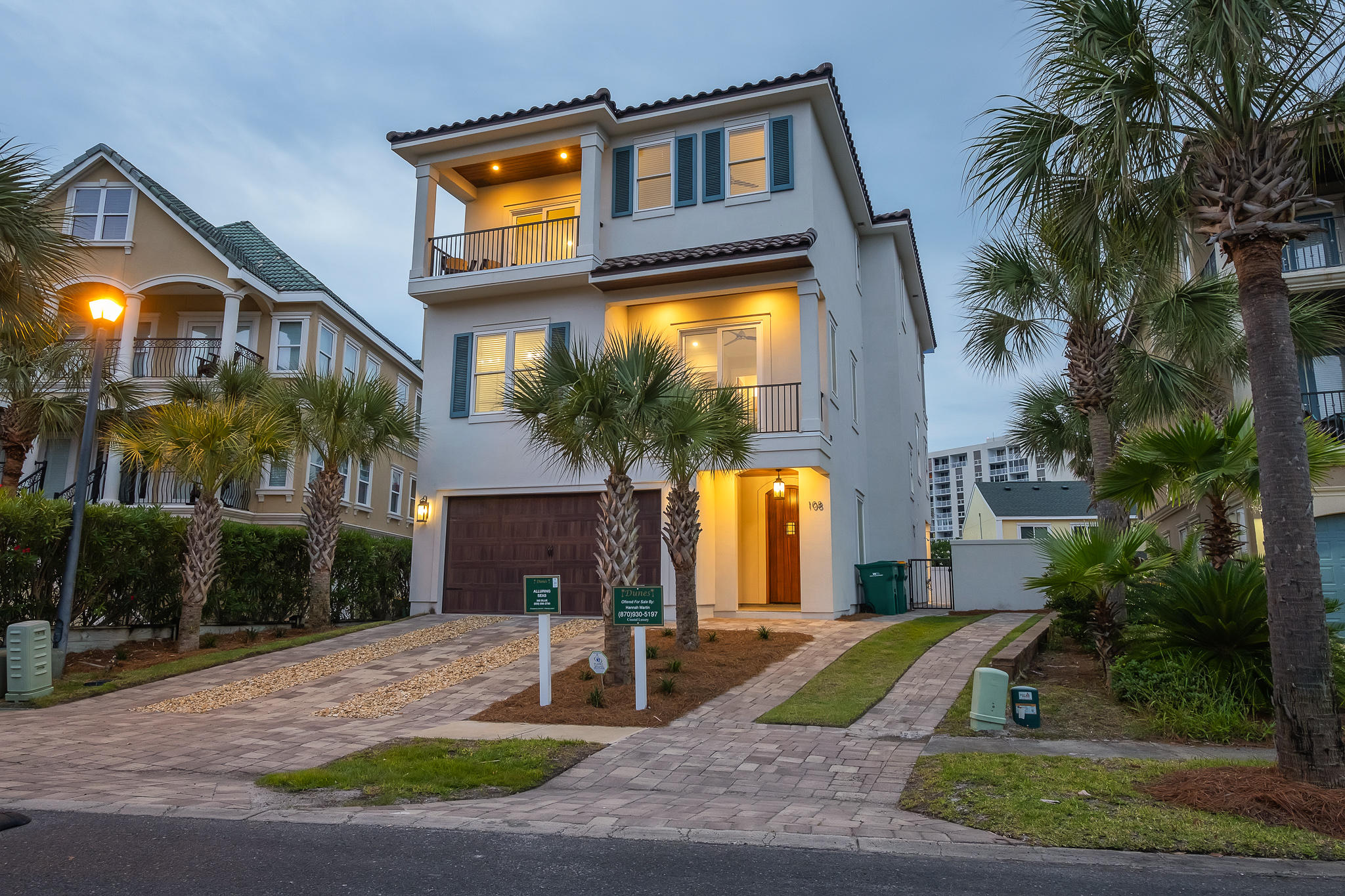 $220k+ projected annual gross rental revenue! Located only 1 block from the beach in the exclusive, luxury community of Dunes of Destin, ''Alluring Seas'' features a uniquely designed home with 360-degree Gulf views from the rooftop deck. This designer-decorated property includes accommodations for 24 guests, expansive indoor/outdoor living areas boasting exceptional amenities including a Watermark-built private resort style pool area & adjoining spa, as well as a covered outdoor summer kitchen. Entering the front door, guests are greeted with the refreshing and coastal ambiance inside the foyer, accented by the hardwood floors and shiplap on the walls and ceiling.