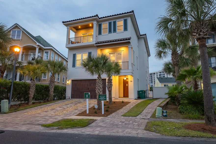 $220k+ projected annual gross rental revenue! Located only 1 block from the beach in the exclusive, luxury community of Dunes of Destin, ''Alluring Seas'' features a uniquely designed home with 360-degree Gulf views from the rooftop deck. This designer-decorated property includes accommodations for 24 guests, expansive indoor/outdoor living areas boasting exceptional amenities including a Watermark-built private resort style pool area & adjoining spa, as well as a covered outdoor summer kitchen. Entering the front door, guests are greeted with the refreshing and coastal ambiance inside the foyer, accented by the hardwood floors and shiplap on the walls and ceiling.