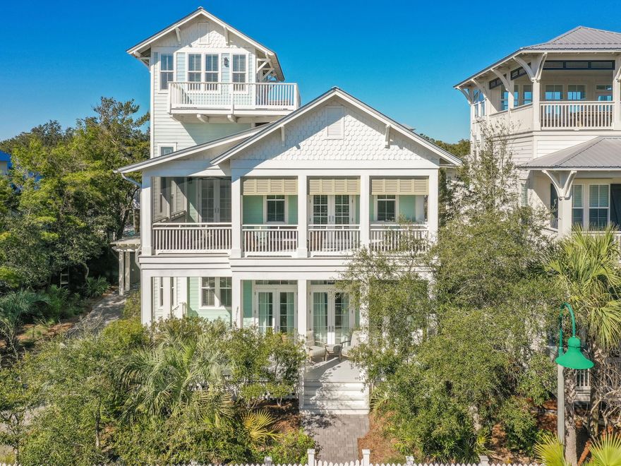 This elegant, beach cottage home has it all, including a private, heated pool. The newer construction home, built in 2014, in gated Old Florida Beach community has never been rented.  Enjoy expansive views of the Gulf of Mexico and Draper Lake from the third floor living space and open sun deck.   The four bedroom and four and half baths home has an open floor plan and bedroom on the first level.  Separate living area on all three floors.  The master bedroom includes a private balcony.