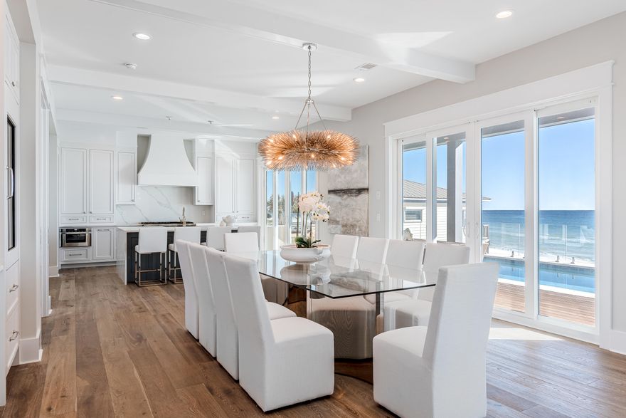 25 Fort Panic Road, a new-build construction on the quieter end of 30a, offers luxury and elegance to the highest degree. 25 Fort Panic is situated on the largest lot in Fort Panic, offering 75ft of prime Gulf frontage. The beautiful views are captured by floor-to-ceiling windows, oversized balconies on each floor, and a gorgeous private swimming pool and sundeck that faces the Gulf. Enjoy the five bedrooms, six bathrooms and large, open-concept living and dining areas that flow together to create a communal space perfect for entertaining. The state-of-the-art kitchen is stocked with cutting-edge appliances and beautiful white countertops and cabinets that complete the modern-meets-coastal design.