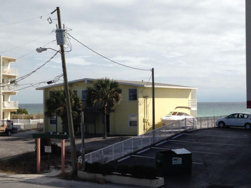 ONLY A 1 MINUTE WALK TO THE BEACH! Very neat & well maintained furnished 1br/1ba on Okaloosa Island. A/C, refrigerator & built in microwave are all 2 yrs. old. Fantastic location on Okaloosa Island! Tropical Isle amenities include nice pool, grilling area & laundry room. Affordable way to enjoy life at the beach!! Unit Sold 'as is'. Few items belong to tenant...