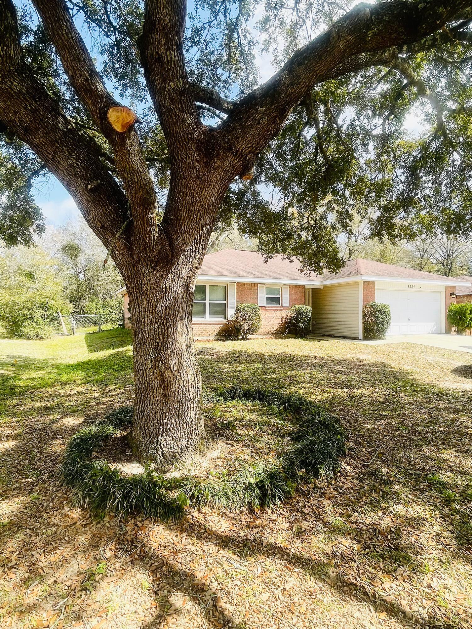 RENOVATED in 2016 and READY FOR NEW OWNERS! This charming 3-bedroom, 2-bathroom home with a 2-car garage sits on a SPACIOUS .36-acre lot. The home features many UPDATES including a kitchen equipped w/ stainless steel appliances, upgraded cabinetry, GRANITE countertops and a breakfast bar. No CARPET here, ceramic tile flooring throughout! The open floorplan is inviting and allows natural light to enter from the front and back of the home. The bedrooms are split on either side for added privacy and there is a BONUS ROOM - the perfect space to use as an office, extra storage, or large pantry! There is also AC in the 2 car-garage! This home is just minutes away from the new Publix Plaza, as well as downtown Milton and the Blackwater River. This can be a quick close, move-in ready!