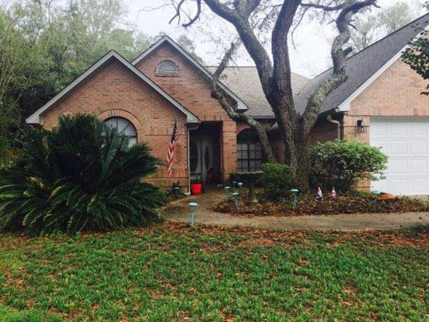 CUSTOM WOOD COUNTERTOPS, NEW PAINT, VAULTED CEILINGS, CROWN MOLDING, TILED KITCHEN DINING AREA, IVAN ROOF, NEWER AIR AND HEATING UNIT, 2 CAR GARAGE,1 EXTRA NICE STORAGE BUILDING AND 1 UNFINISHED MOTHER IN LAW SUITE, HUGE YARD WITH STONE PATIO, UPDATED FLOORS, AND A NEW FENCE! COME SEE THIS PLACE BEFORE IT IS TOO LATE!!