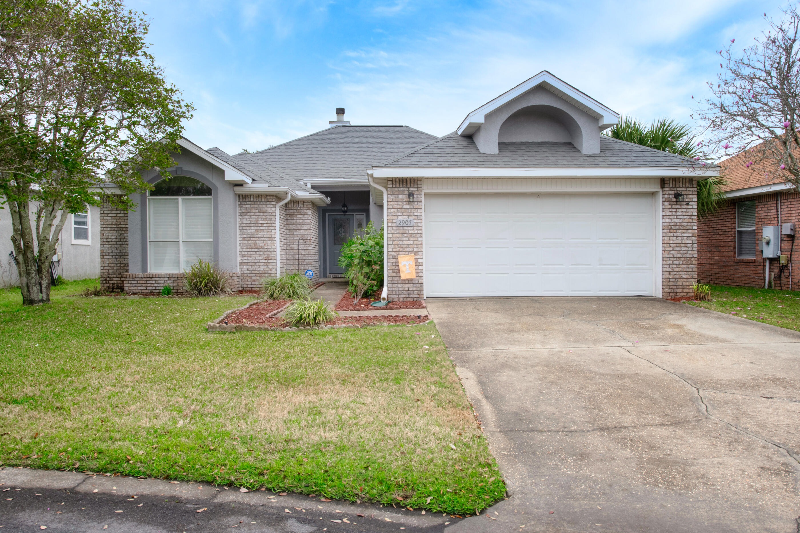 This immaculately maintained all brick home is situated on the 2nd fairway of the Shalimar Pointe Golf Club is now available. With a gas fireplace, formal dining room, and open living area with great natural light from the sliding glass doors and windows this home is perfect for entertaining. Beautiful plantation shutters accent the windows and doors. The master bedroom is large enough for a king-sized bed and 5 piece master bath features a separate garden tub. You'll love the recently updated guest bathroom. Excellent golf course views from the patio, living area, eat-in kitchen, and master bedroom. Walking distance from the club house which features food, drink, and local Friday night happy hour.