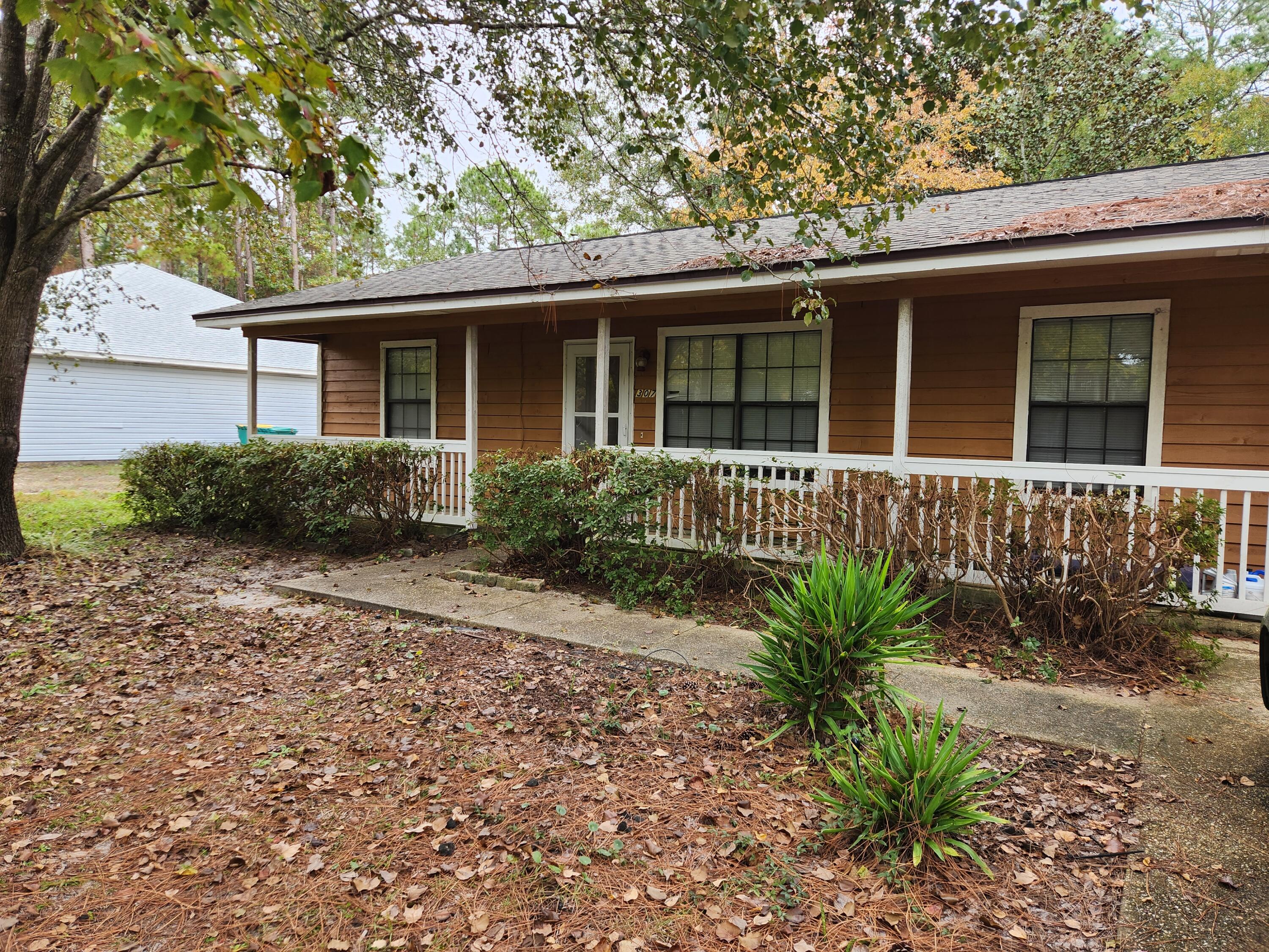 Welcome to 307 Ridgewood Ave in Wynnehaven Beach Estates! This 3 bedroom 2 bath home is waiting for you. Enjoy your morning coffee under your covered front porch, or step through the sliding glass door to relax by the backyard firepit in the evenings. Store your yard tools in the outdoor shed, or use it as additional storage space. Exterior paint is only 3 years old. Just 10 minutes to Hurlburt Field, and 30 minutes to Eglin. 2021 roof, 2023 HVAC, and 2015 water heater. Schedule your showing today!