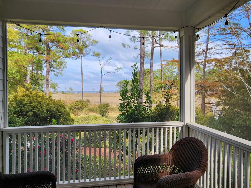 Oriented to the Bay, this 3 bed, 2 bath, 2100sf waterfront home on McQuage Bayou is set on 5 lots, totaling 1 acre, making it one of the most unique properties in Point Washington. Enjoy the expansive bayou and bay views from every room in the house. Mature professionally landscaped yard and gardens provide a touch of color year round. The one-level elevated home offers a two car garage and ample additional parking, with room to hide a boat out of site. Dock already built and ready to enjoy the boating life. Open floor plan and 10-14ft ceilings throughout, create a sense of space. Dream kitchen with natural lighting, refinished solid maple and travertine flooring throughout. More adjacent land available allowing buyer to buy from street to street, with two docks, 8 lots totaling 2.2+ acres