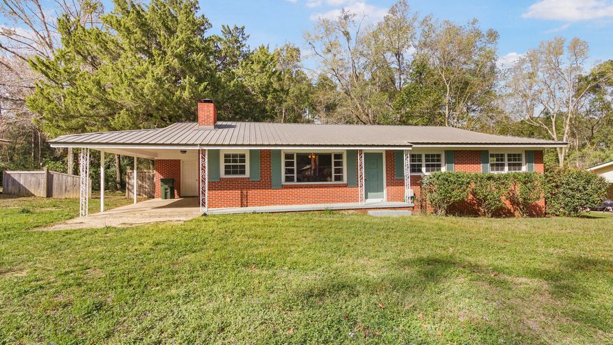 Newly updated classic brick mid-century home in a well established, tucked-away neighborhood in a fabulous location, especially for anyone commuting from DeFuniak Springs. Near 331S and I-10, this charming home offers 3 bedrooms, 2 baths on 1/3 of an acre backing up to woods for privacy. The original hardwood floors, cool kitchen peninsula and brick woodburning fireplace add charm you just can't recreate in new construction. With new paint, refinished floors, freshly painted cabinets throughout, new countertops and appliances, along with a newer AC (1.5 years old) you can settle right in. The metal roof is appx 10 years old and has plenty of life left. Enjoy the privacy of the back deck and fenced in yard with family and friends. There's even room for a pool. Don't wait to see this one!