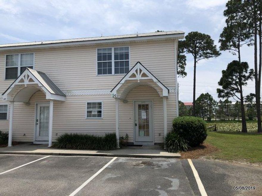 REO. Summerlake end unit is walking distance to the beach! This 2 Bd / 2.5 Ba townhome offers tile floors throughout with an open layout. First floor has kitchen, dining, living & half bath. There is also a screened porch for enjoying summer evenings. Both bedrooms are situated on the second floor & include private baths. Summerlake features a community pool & is walking distance to the beach, grocery store, plenty of restaurants, & entertainment. Great opportunity for primary residence, 2nd home or rental investment. May qualify for seller (vendee) financing.