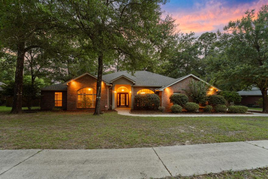 Welcome to 5848 Saratoga Dr, Crestview, FL 32536--where charm, comfort, and convenience come together in perfect harmony! Nestled in the highly sought-after Silver Oaks Subdivision, this sprawling 4-bedroom, 2.5-bathroom retreat is designed to impress from the moment you step inside.With 2,584 square feet of thoughtfully crafted living space, this 2004-built beauty is the perfect blend of elegance and function. Split floor plan with each bedroom boasts expansive walk-in closets, ensuring ample storage for all your treasures. The master suite is a true sanctuary, offering his-and-her vanities, a soothing whirlpool tub, and a separate shower, setting the tone for pure relaxation.  Step into the gourmet kitchen, where Corian countertops gleam under the warm glow of lighting. Tile flooring, a spacious pantry, and modern appliances make this the ultimate culinary playground. Whether you're cooking for one or entertaining a crowd, this space effortlessly caters to every occasion.

The living room and den, wired for surround sound, invite you to kick back and enjoy movie nights like never before. 

Outside, the fully fenced backyard is a slice of paradise. Imagine grilling under the stars with gas hookups on the back porch, surrounded by lush greenery kept pristine by an inground sprinkler system.  

The home also offers a full house generator, new window seals, fully monitor security system and new roof from 2024, 2020 AC, 2019 Tankless Water Heater and the septic tank was pumped in 2024.
