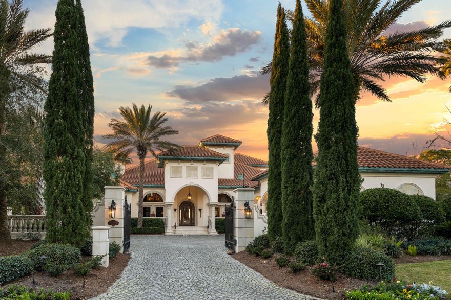 Welcome to a home that is inviting and breathtaking all at once, incorporating Floridian Bayfront living with resort luxuries. This gated estate encompasses 107' on Choctawhatchee Bay with golf cart access to The Village of Baytowne Wharf with full-service Marina, boutiques and eateries, along with the Sandestin Golf and Beach Resort at your doorstep. This is a home that effortlessly welcomes your guests one evening, while granting comfort and privacy to your family every day. Four of the five Bedroom Suites have Bay views and open to the outdoor living area including infinity pool, jacuzzi, and private dock with boat and jet ski lifts. A second entertainment kitchen, dining and living area open to the outdoors with sliding glass walls. Design masterwork abounds in this home.