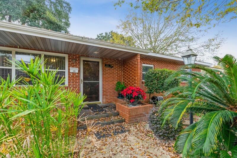 Hello Happy Home! Oh the possibilities! New Roof! Rinnai Tankless Water Heater! Newer HVAC! Homesteaded by the current owner for many years, this is a well taken care of, cherished Fort Walton Beach home. There are 5 bedrooms in this home, but the additional flex room could also qualify as a 6th bedroom. This house has so many great and unique custom features, included a great central kitchen equipped with a gas Viking stove, a Bosch dishwasher and beautiful solid wood cabinetry where everything a cook could need would have a place. The kitchen pantry is big enough for all your food storage needs. Speaking of storage, you will never lack for storage of any kind in this home!! White refrigerator, tv, treadmill, clock and tools do not stay with sell. Adjacent dining area and front parlor/ living-type living room is warm an inviting .
The bedrooms are split with the original three on the front of the home, including the primary bedroom with private bath. Two more bedrooms, separated by the mud/laundry room are easily handicap accessible from the side/carport entrance.
The comfy and inviting den boasts a wood-burning fireplace, cleaned and stocked with firewood for the new owner. This fireplace can warm the whole house with its built-in blower system. Then there is the flex room with its abundant natural light, located opposite the den and the size of the den, this space can be anything you want it to be...that 6th bedroom, exercise room, craft room.... We are pretty sure the Florida room was built to enjoy the backyard from the comfort of the air- conditioned area. Over the years, and with a little help from professional landscapers, the owners created the backyard that you see today. Step out of the Florida room onto a concrete patio area with custom grill and garden swing additions - the setting is perfect for outdoor dining and enjoyment. Pathways wind to various areas and the outbuildings in the yard, including potting stations for home garden projects. There are two storage buildings, one smaller storage shed and a huge workshop with loft area.
This home is being sold "AS IS".