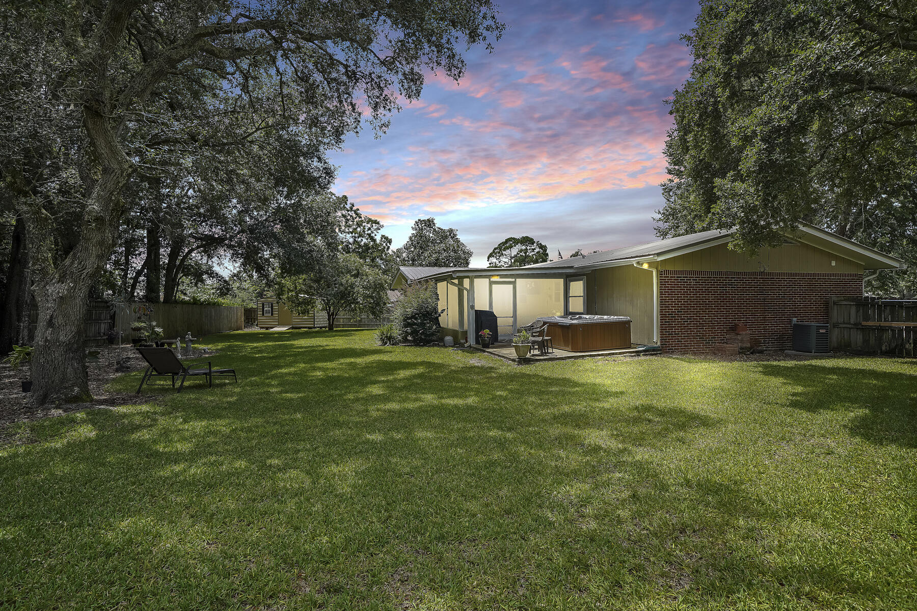 LOCATION & LIFESTYLE....This residential community is a comfortable, peaceful haven, yet perfectly situated to take advantage of all Fort Walton Beach has to offer. Easily accessible to Hurlburt Air Force Base, Minutes away from the beautiful beaches of Okaloosa Island, and within walking distance to theaters, cafes and restaurants. Situated on a cul-de-sac, this modish ranch style home has been modernized with an open concept kitchen featuring newer appliances, 2 living areas with plenty of entertaining space, updated bathrooms with stylish vanities and attractive flooring. Master bedroom has an en suite. Enjoy those summer days and cool nights relaxing and gazing from your family-sized Florida room.There is 8x16 yard building out back to keep all your lawn and gardening tools