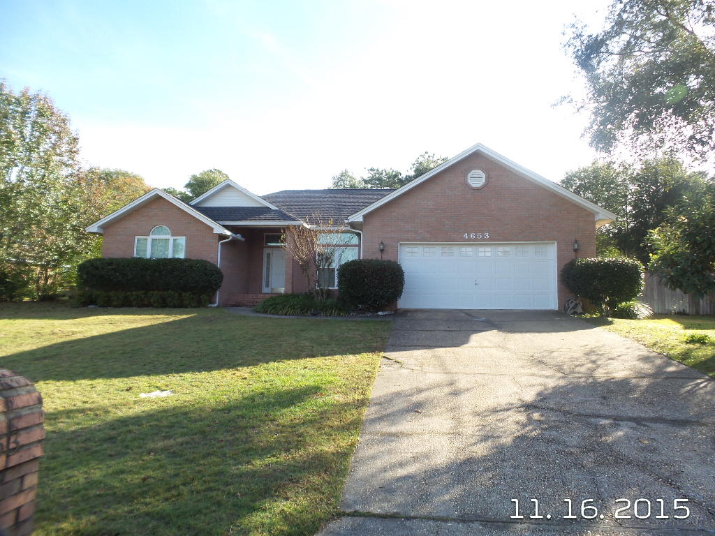 Available NOW...Move In Ready home. South I-10 Executive brick home in desirable area. 4/2 floor plan with vaulted ceilings, custom tiled floors, fireplace, formal dining room, eat in kitchen, and breakfast bar. Spacious master bedroom with treyed ceilings and window coverings. Master bath features double vanity, custom shower, garden tub, and water closet. Large laundry with washer and dryer provided. Over-sized 2 car garage with mature landscaping. This home features an in-ground pool with pool care included in rental rate. Outdoor entertaining on the covered back porch area. Additional bedrooms are large as well as guest bathroom. No inside smoking. Pets allowed with owner approval and a $400 non-refundable pet fee.