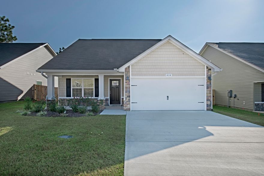 Cottage style, home that has a spacious open concept downstairs floor plan. Light and bright kitchen is complete with breakfast bar, pantry, stainless steel appliances over-looking the Dining area. French doors from the dining room lead you to to the privacy fenced back yard and lanai. Downstairs Master suite offers, dual spa sinks, large walk in closet, separate shower and tub. Upstairs are the additional bedrooms with nice size closets and a bathroom. Decorative columns, cedar shake vinyl siding and stone accent the exterior of the home. Inside laundry room is accessed from the two car garage. Seller will pay up to $3000 of buyers closing costs with the use of one of the preferred lenders.