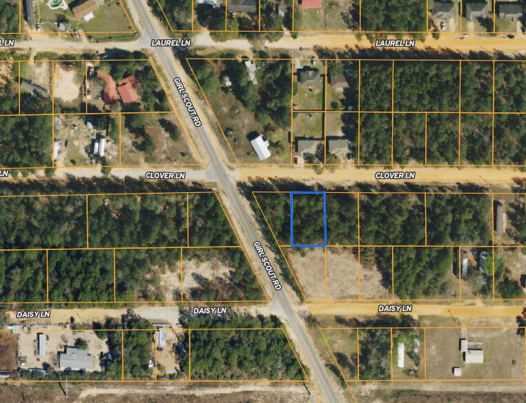 This 80x125 lot is just under 1/4 acre and located just off paved road in growing Mossy Head area of Defuniak Springs. Property is located minutes from Blackstone Golf Course and I-10. Defuniak Springs & Crestview less than 20 minutes and apx. 40 minutes to Niceville & Eglin AFB. No utilities currently on the property but power on street. Public water is available (tap fee would need to be paid through Mossy Head Water Works). Septic would be required. Lot 3 is also available. Manufactured homes allowed!