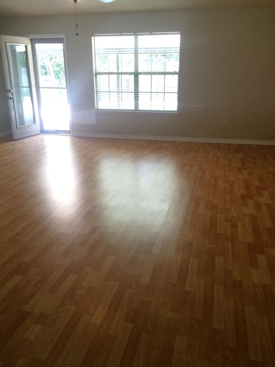 BEAUTIFUL POOL HOME WITH AN OVERSIZED LOT IN HIGHLY DESIRABLE BAY PINES SUBDIVISION! This home is designed for outdoor entertainment! Upon entering this split floor plan pool home, you'll immediatly notice the low maintenance wood laminate flooring flowing throughout the main living areas. From the living room and kitchen, you'll have a view of the gorgeous custom gunite pool. The covered back patiohas everything you need to begin your summer fun, complete with custom built bar and kegerator! You won't have to decide if you want to swim or watch your favorite sports game, you can do both at the same time as the patio is wired for cable tv. On those rare but chilly Florida nights, invite your friends to come gather around the firepit. This lot backs up to an undeveloped wooded lot.