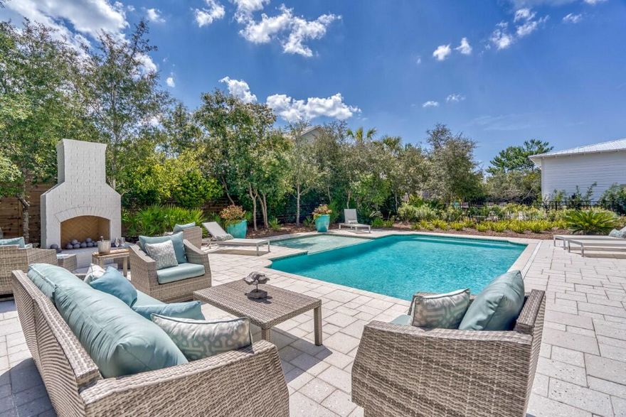 Private Heated Pool, Deeded Beach Access & Gulf View! Capture an unmatched 30A lifestyle at 134 Walton Gulfview Drive. This peaceful haven is positioned on a beautiful street, backing up to the nature preserve. This stunning getaway can be a coastal escape for you and your family as well as a top-producing rental property with projections at $211,600 & cash on cash return projections at over 6% per year. Beautifully designed, the home offers a modern blend of indoor and outdoor living spaces. Serving as a perfect seaside retreat, 134 Walton Gulfview features exclusive deeded beach access, an outdoor kitchen, outdoor fireplace and a private heated pool. The chef's kitchen showcases Thermador appliances and quartzite countertops. Positioned just minutes from Alys Beach, Rosemary Beach & Seacrest Beach, this home sits in the perfect location to enjoy a peaceful sanctuary while also being close to all the top dining, shopping and entertainment options on the east end of 30A. The heart of this home is the expansive first floor great room along with the amazing outdoor dining area. The first level features an elegant primary suite. The second floor offers two additional primary suites. And the top floor has a gorgeous built-in bunk area. Each bedroom has their own ensuite bathroom. And the property boasts multiple balconies and covered porches. Offered fully-furnished, this property can be a lucrative investment property and comes with strong actual rental history. Explore this sanctuary designed for relaxation, connection and unforgettable memories on the coast!