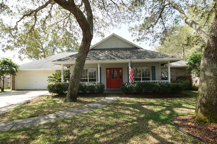 Check out this beautiful three-bedroom home with an office located in Bluewater Bay's popular Parkwood Estates. The large family room has a wood burning fireplace and built in bookcases to showcase your collection. The room is a perfect place to relax with the family or entertain guests, but the split floor plan ensures you still have privacy when you need it. The master bedroom includes a newly renovated bathroom, featuring a spa like master bath for those indulgent nights. Bar seating in the open kitchen provides the perfect place for a quick meal. The den features French doors for added privacy and has a beautiful view of the front yard. The spacious backyard borders Bluewater Bay Elementary School and Fred Gannon State Park. Additionally, the backyard includes a large, screened (click