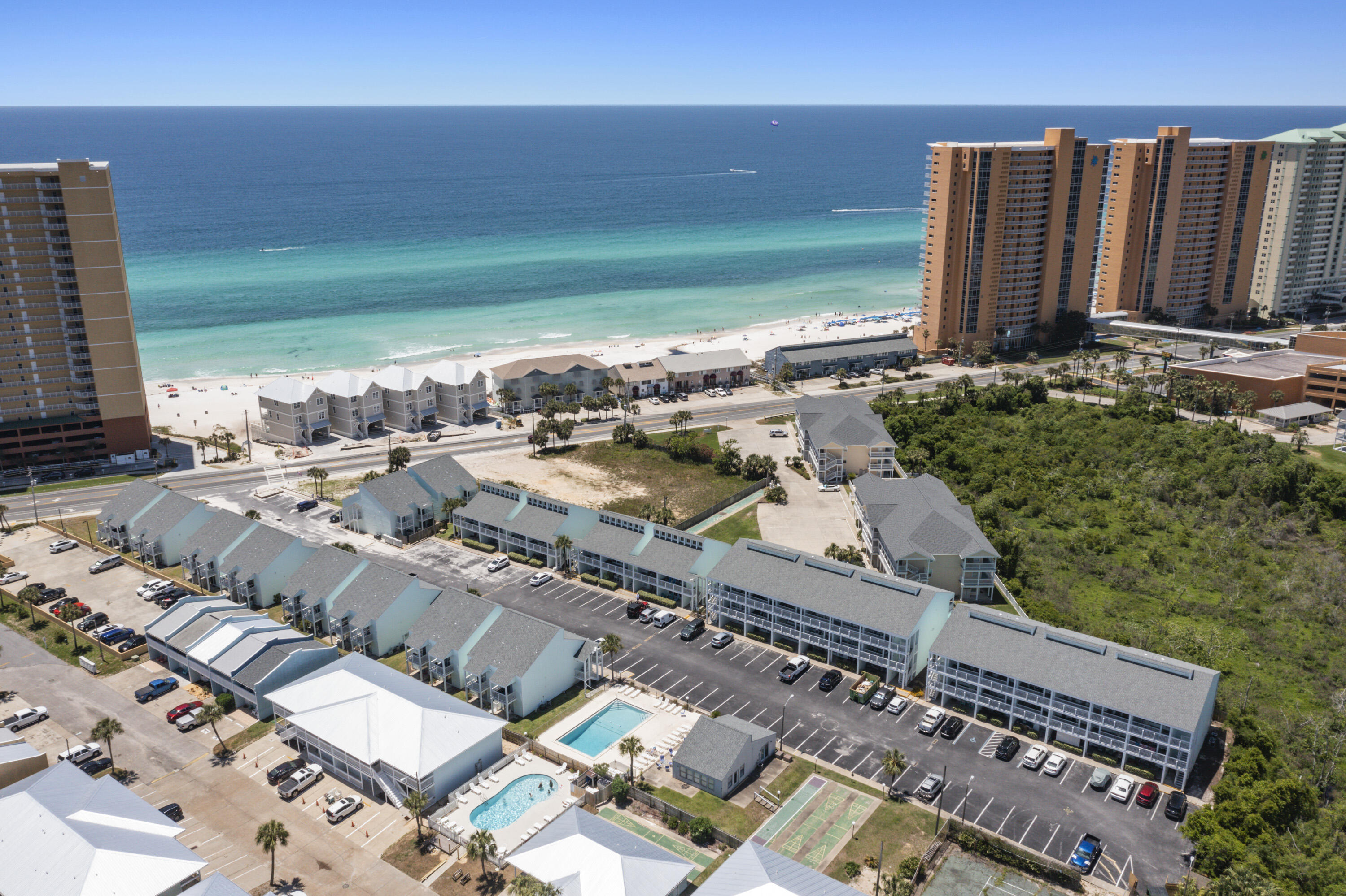 Come see this AMAZING condo located in the desirable Laguna Beach area of PCB!! This 1 Bed, 1 Bath condo with hallway bunks is recently renovated and move-in ready! Featuring fresh interior paint, an updated kitchen, LVP flooring, and stainless steel appliances, this cozy, beachside haven is completely turnkey! Water Heater 2021, HVAC 2015. Stylishly decorated, and all furniture and decor conveys with sale! Located the end of the Southwinds complex, you and your guests will enjoy relaxing on one of TWO patios at this adorable condo oasis! Near the pool and extra parking, Building "H" does not have another building across from it, giving you added seclusion and quietude. Unit H-9 offers the best of both worlds-- Privacy AND Convenience! In addition to peace and tranquility, you'll appreciate having beach access just steps across the street. Walk to restaurants, local shops, grocery stores, etc. Only 2 miles to Pier Park, 7 miles to 30Avenue @ Inlet Beach, and 14 miles to NWFL Beaches Intl Airport! This West PCB location is highly sought after by owners and vacationers, alike! DON'T LET THIS OPPORTUNITY PASS YOU BY! SCHEDULE YOUR SHOWING TODAY!