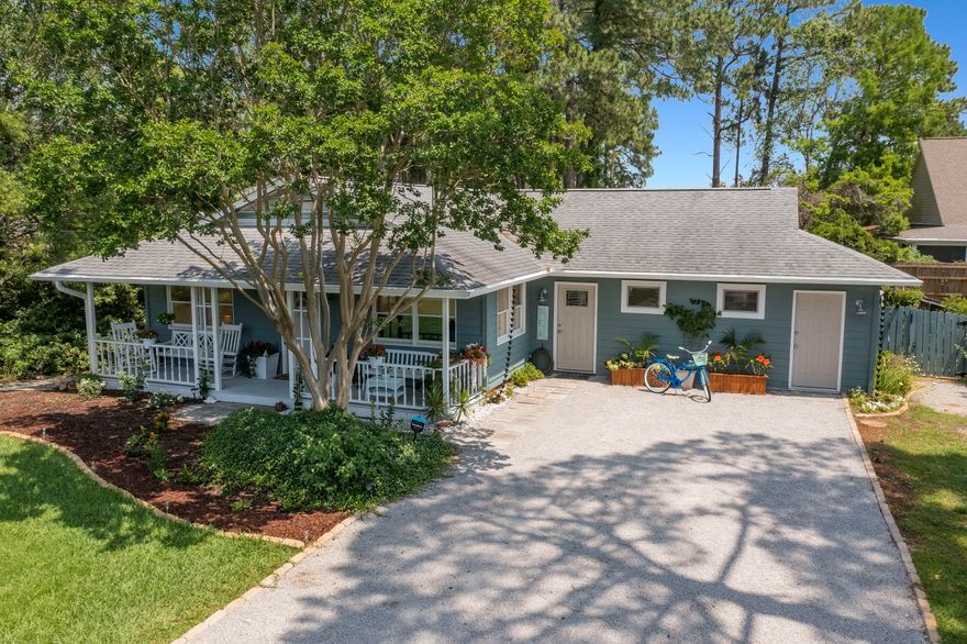 BOHO CHIC BEACH COTTAGE! Less than a mile to the beach at Pompano Joes. Huge driveway for your car, truck, boat, RV and/or Golf cart! Or add a garage! Updated, new Kitchen, floors, baths all in fall of 2020. The in ground pool has been resurfaced and is huge too! 15 X 30. You will be one street over from the Bay and the Bayfront park! Take your kayaks to the Bay in minutes. Or go to the Beach in your Golf Cart, or Just Walk!  No HOA, could possibly be a vacation rental. Currently set up to sleep 4 adults and 3 kids, however, lots of space to add a 4th bunk or bedroom. Nice Laundry area with sink, 3RD Bath, extra Refrigerator, and storage.  Easy entrance from the pool to this area, wet people, suits can all get a cold drink, shower or potty without going thru the house!